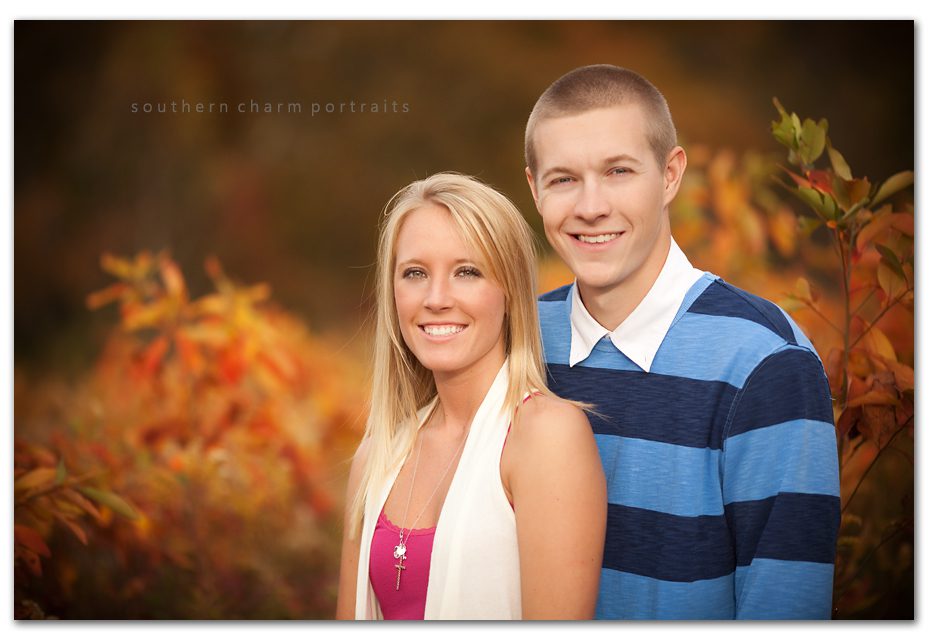 beautiful couple, love the orange fall background, middle of 5 foot briers and plants