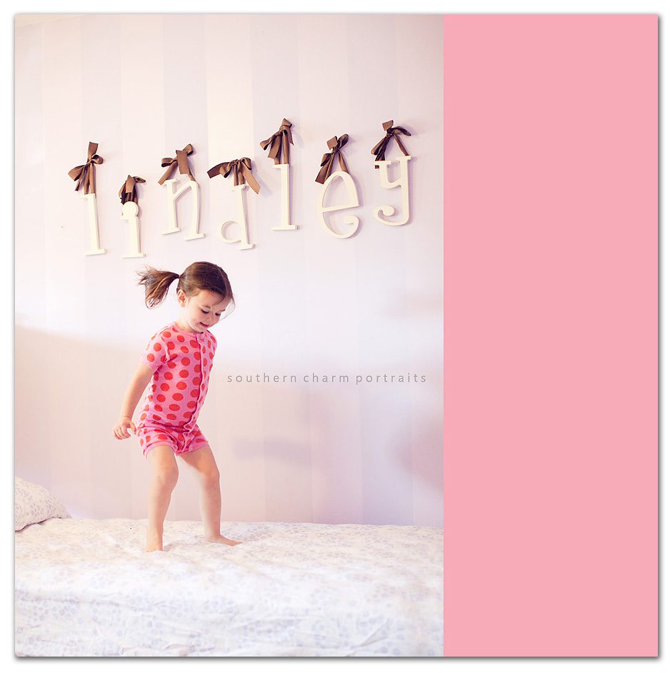 cute toddler girl's room, painted purple stripes, name letters on wall, polka dot pjs jumping on bed