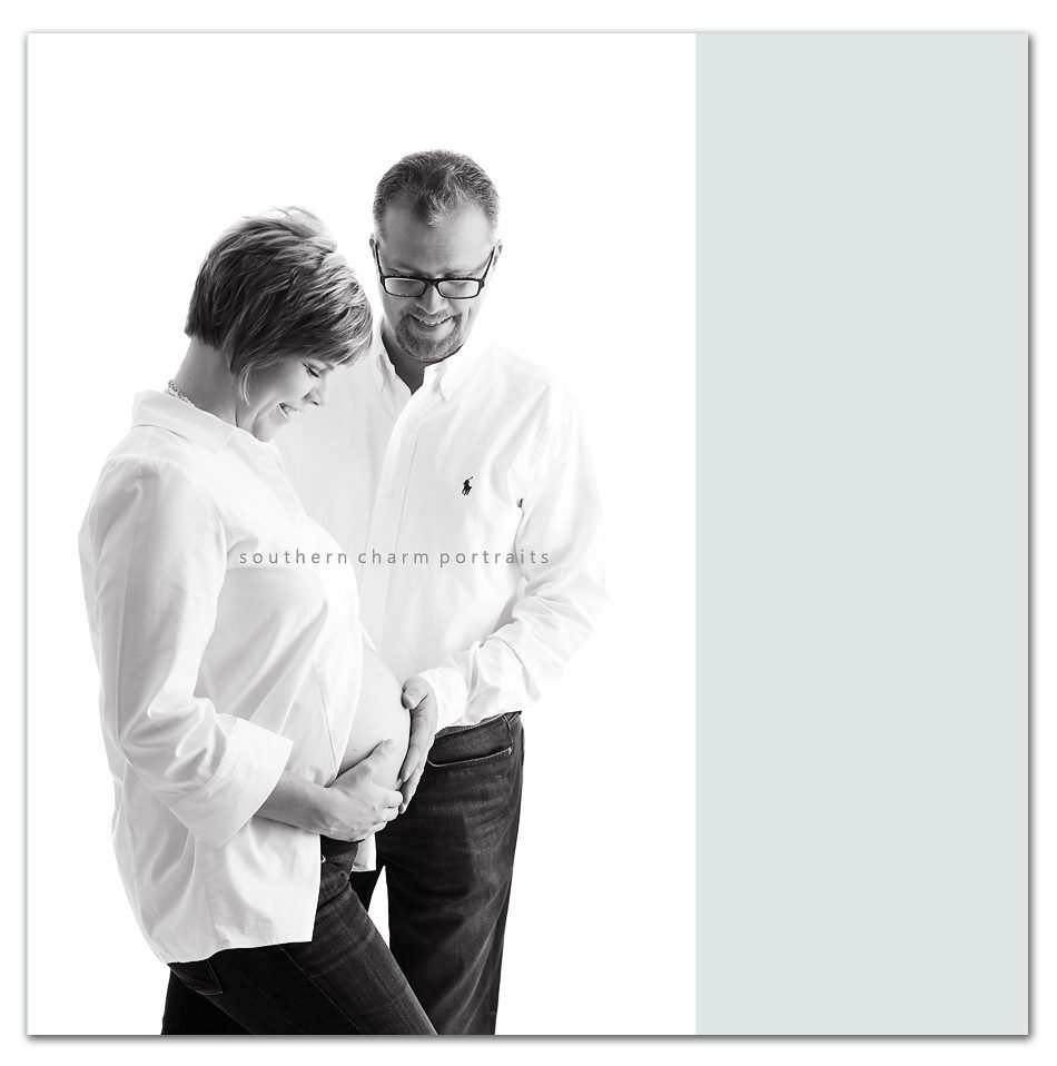 couple in studio on white backdrop with white shirts