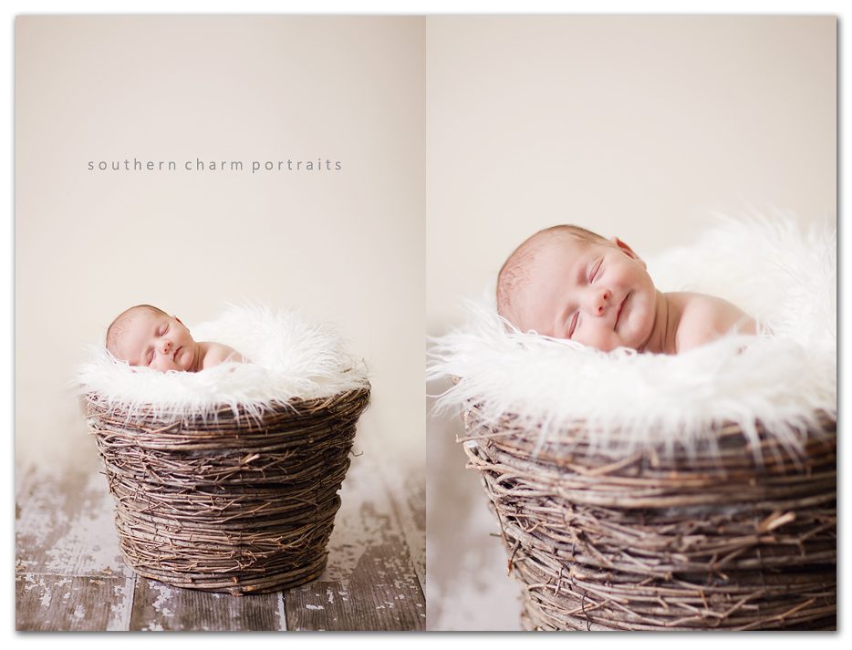 baby in basket sleeping with a sweet smile