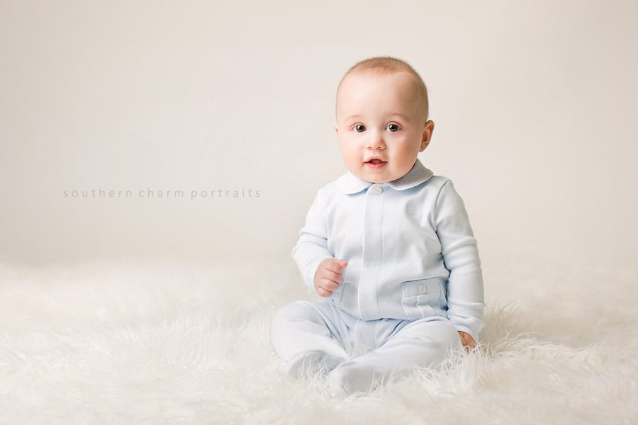 six month old baby boy in ralph lauren baby blue layette outfit 
