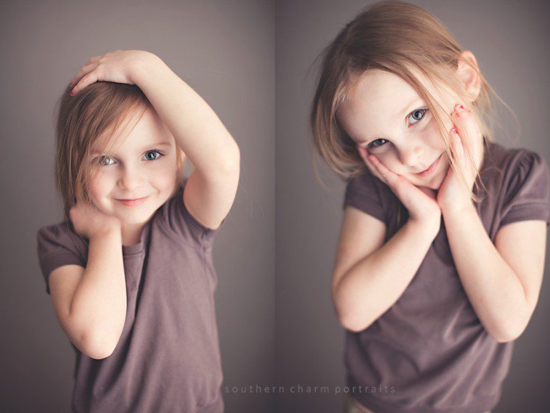child posing herself in studio with work clothes on