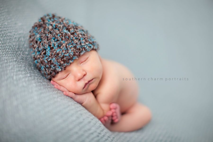 baby sleeping with hat on