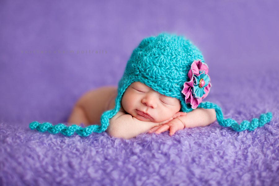 gorgeous image of sleeping newborn girl with hat