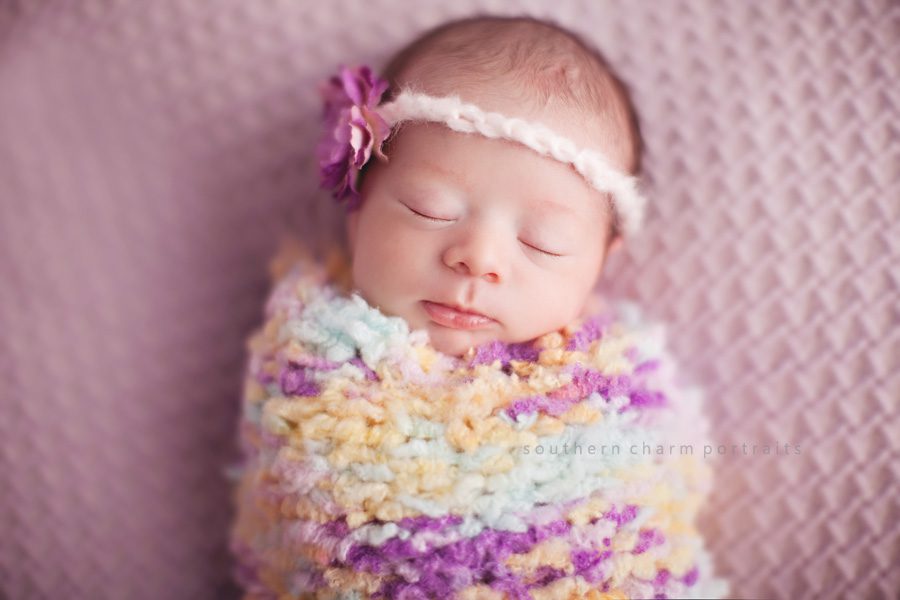 baby in wrap and matching headband