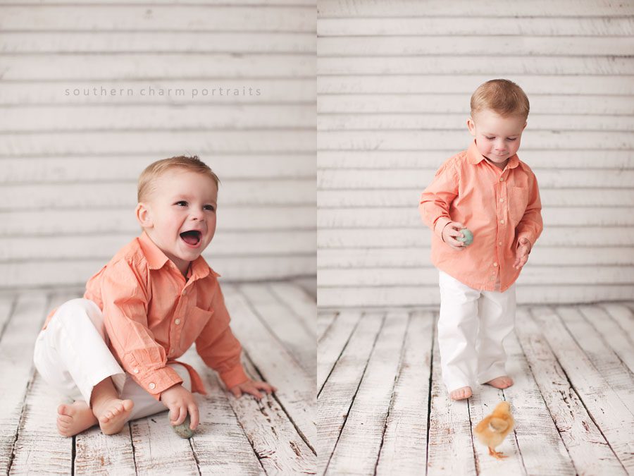 little boy laughing and holding easter egg