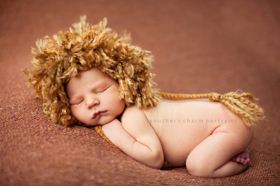 baby in lion hat sleeping